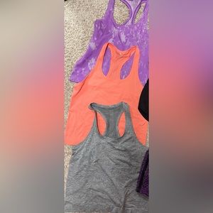 Lululemon size 8  swiftly racerback 2.0 tanks race length( lot of 3)